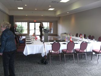 view of luncheon room with members assembling