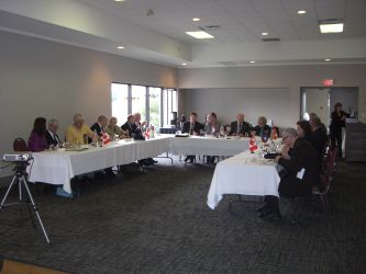 members sitting at the dining table