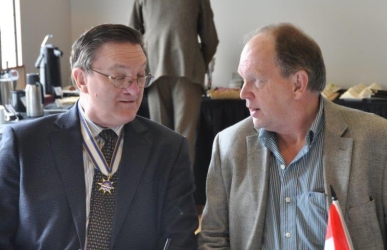 Gary Mitchell and Dave Obee at the dining table