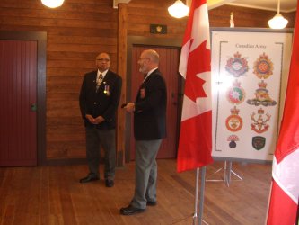 Steve Cowan talking to His Honour in the heraldic display room