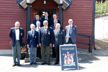 group photo in front of the display building