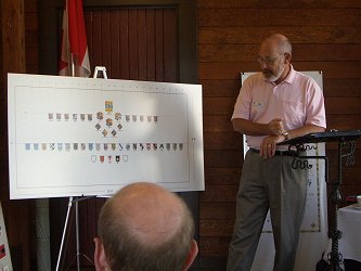 Steve Cowan showing a proposed heraldic poster